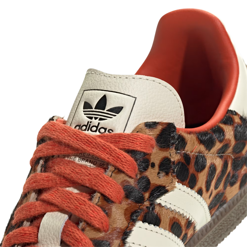 Samba Og Preloved Red Leopard close-up showing Adidas branding and leopard print design.