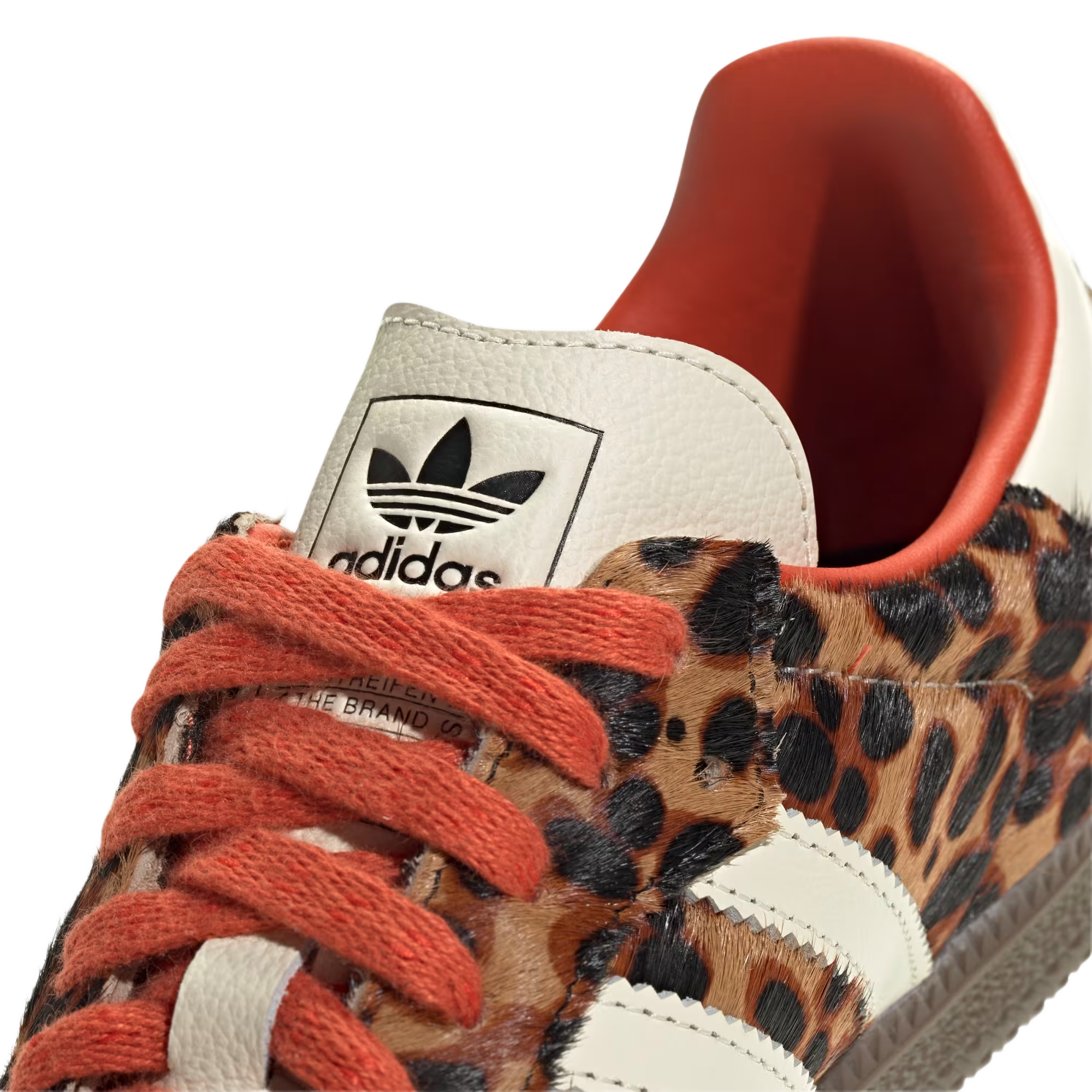 Samba Og Preloved Red Leopard close-up showing Adidas branding and leopard print design.